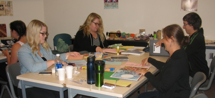 Social Work Students work on their journals